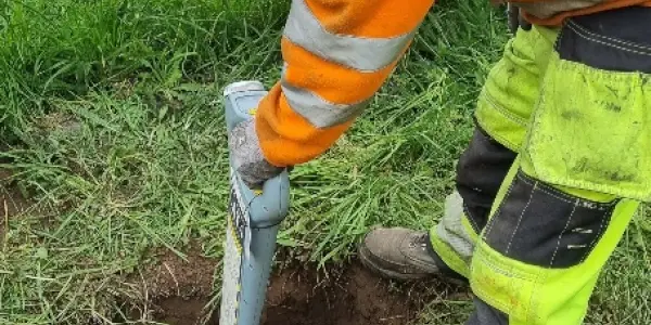 construction worker digging underground groundworks.