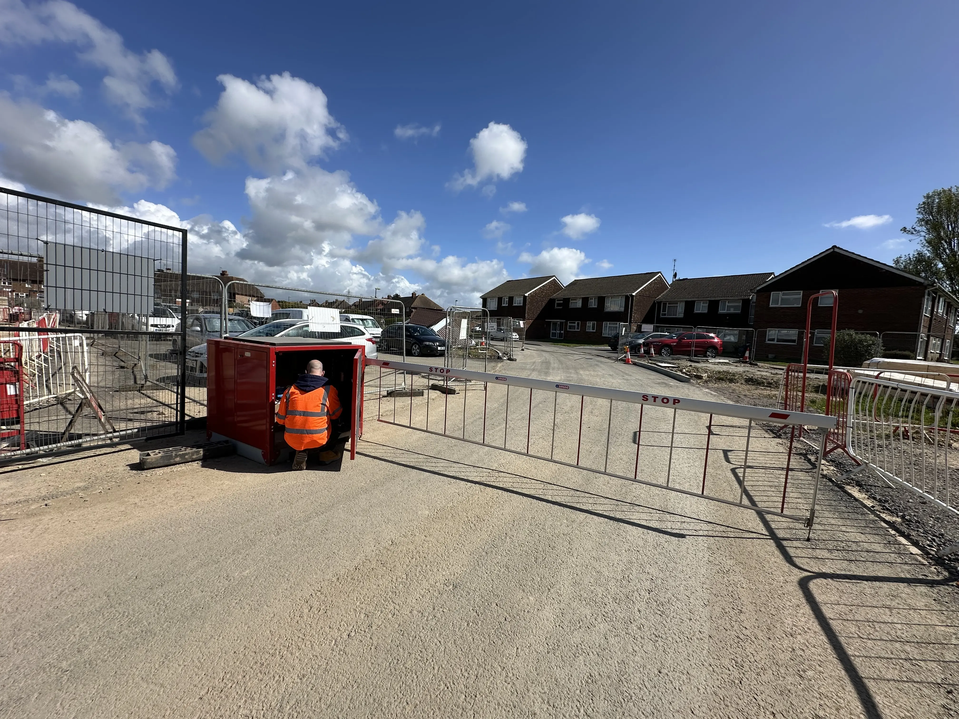 field engineer maintaining SOSEC 200 V2 barrier on construction site